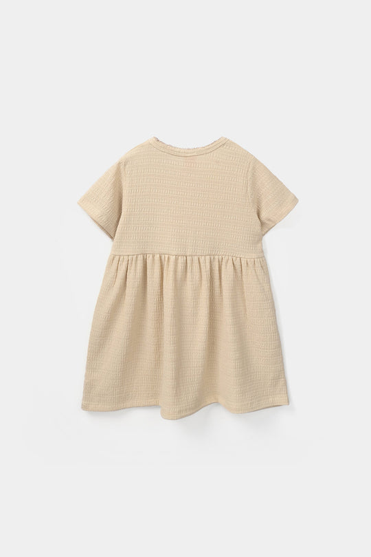 Girls Poly Crinkle Knitted Frock Flower - Beige